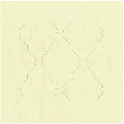 A pencil drawing, very faint, on a yellow paper shows hourglass patterns