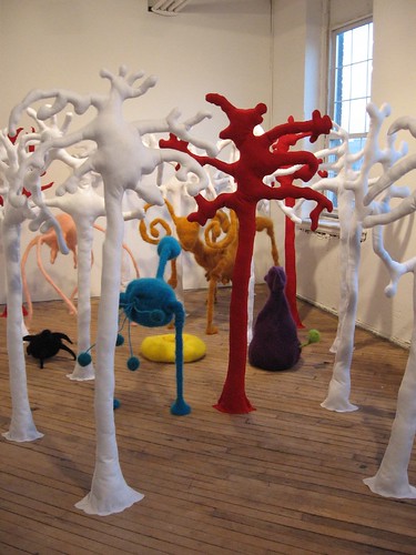 Alexandra Newmark, In the Forest; the trees are about 6 feet tall. The animals are knit from mohair.