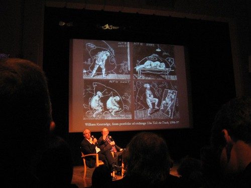William Kentridge (left) and Michael Taylor, at the Philadelphia Museum of Art earlier this year, in front of a projection of selection from Kentridge's portfolio of etchings, Ubu Tells the Truth, 1996-7 