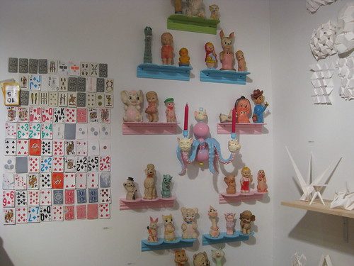 Installation shot, Jeremiah Hensen's card collection, NY pickups from 2006, Adam Wallacavage's squeaky toys, Brendan Kellogg's kinetic sculptures with planar and hinge elements.