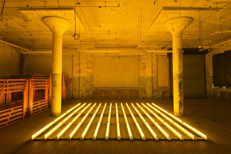 Jaime Alvarez installation of lights in warehouse for Forcefield Festival