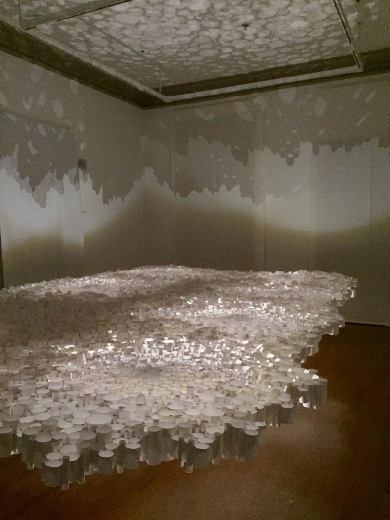 Sun Young Kang, In Between, Strathmore Bristol heavy weight paper, glue, fishing lines, motion sensored lights, 15’ x 8’ x7," 2014, Image courtesy of the artist. Photograph by Caitlin Beattie.