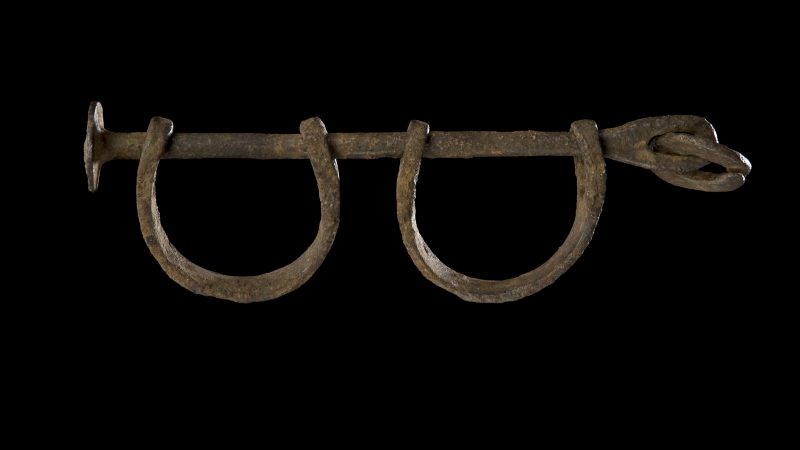 “Shackles," Iron, 2 ½ x 9 x 1 ¼ inches, before 1860. Collection of the Smithsonian National Museum of African American History and Culture.