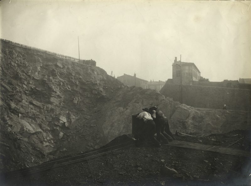Felix Thiollier (French, 1842–1914), Tipping a Coal Bin, c. 1900. Gelatin silver print, 11 3/4 x 15 3/4 in. Collection of Michael Mattis and Judy Hochberg.