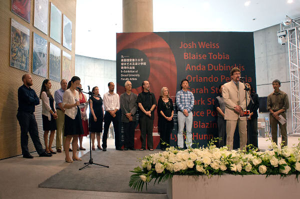 Reception for "9" at CAFA. Dr. Joseph Gregory, Department Head of Art &amp; Art History, speaking.