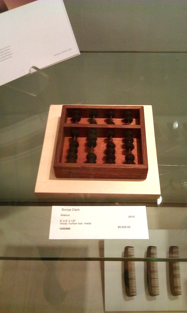 Sonya Clark, Abacus, 2010, wood, human hair and metal, 5 x 5 x 0.5 inches