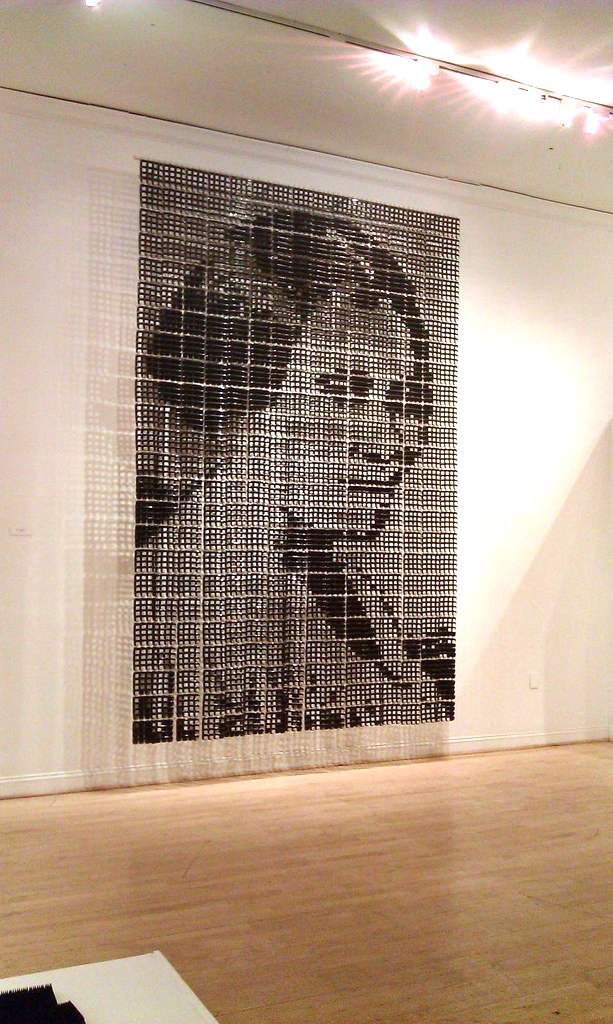 Sonya Clark, Madam CJ Walker (large), 2006, combs, 132 x 96 x 12 inches. Rick Snyderman said  African-American gallery visitors all knew who she was, but not the white visitors.