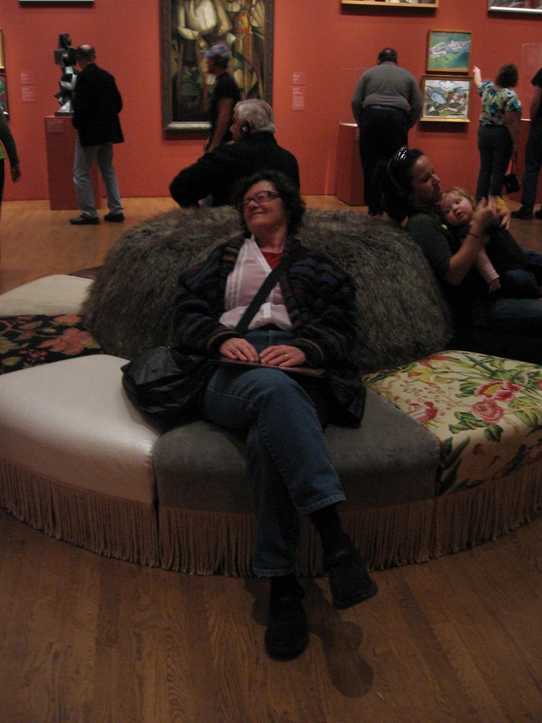 Roberta lounges on Virgil Marti's "pouf"