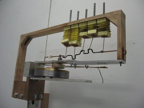 Scott White's Rube Golbergian device, energized by a pendulum