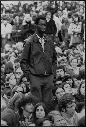 Antiwar rally, Philadelphia, Oct. 1969.The epitome of the face in the crowd, the lonely crowd, the one in the many. A great shot.