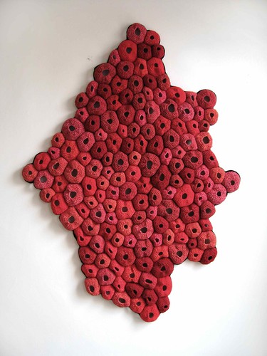 "Pelt" by Emily Barletta. This is included in her current solo exhibition, "My Biology" and it is crocheted yarn - 51 " x 38" x 2"