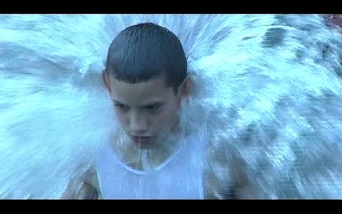 Halo of water around this child in one short moment in the short, elegaic video Waterloo Street is great.