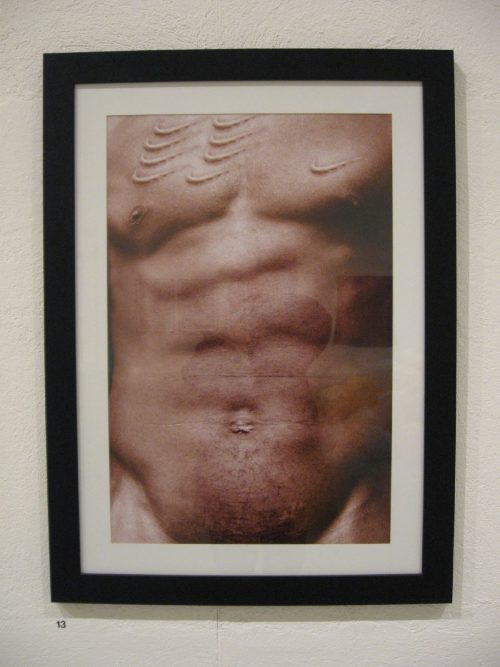 Hank Willis Thomas, Scarred Chest, 2002, 30 x 40 inches, photograph, places the commercial world of basketball and black athletes in the context of tribal scarification, bringing brand loyalty to a shocking level. We first saw work from this series in the Frequency show at the Studio Museum in Harlem.