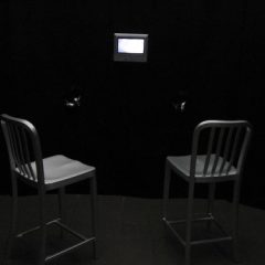 Hooray for the installation of Judy Gelles' video with a pair of silver stools--with backs!!!-- and earphones, inside a curtained-off space.