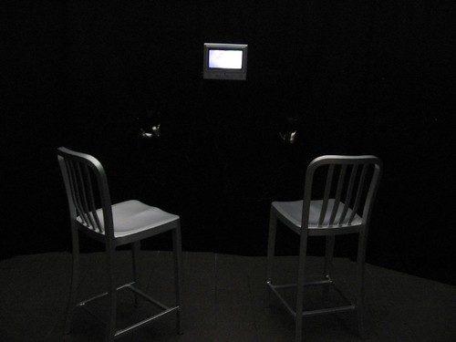 Hooray for the installation of Judy Gelles' video with a pair of silver stools--with backs!!!-- and earphones, inside a curtained-off space.