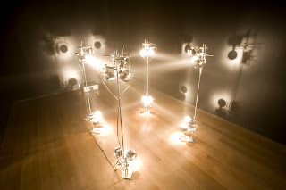 Olafur Eliasson 1m³ light (1999) halogen lamps, steel stands, and fog machine, private collection