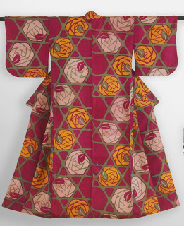 Woman’s Kimono, 1920s–30s. Machine-spun silk plain weave with stencil-printed warp and weft threads (meisen). 61.25 x 43.25 inches. The Montgomery Collection, Lugano, Switzerland.