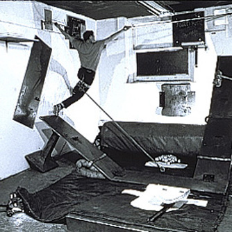 Matthew Barney performing one of his Drawing Restraint drawing actions.