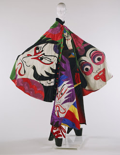 Kansai Yamamoto, (Japanese, b. 1944), Cape, Bodysuit, Chaps, and Clogs (1971), synthetic satin, wool knit. Philadelphia Museumof Art, gift of Hess's Department Store, Allentown.