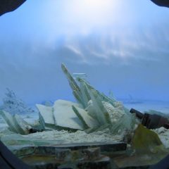 Guy Laramee, The Wreck of Hope, detail of model landscape inside oil barrel