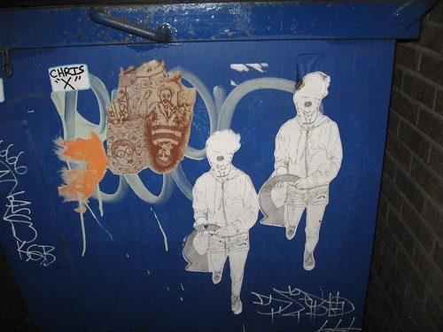 An example of the sort of art Peter Dobrin is writing about, here on a dumpster in South Philadelphia. I know the two figures on the right are by Bonnie Brenda Scott, who's in a show right now at Padlock Gallery.