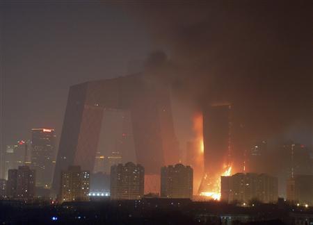 A building located next to the construction site of the new China Central Television is seen on fire in Beijing, February 9, 2009.REUTERS/China Daily. Here is the reuters report.