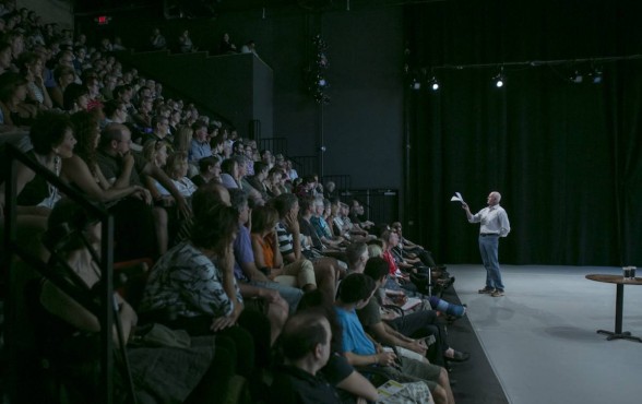 actor on stage and audience