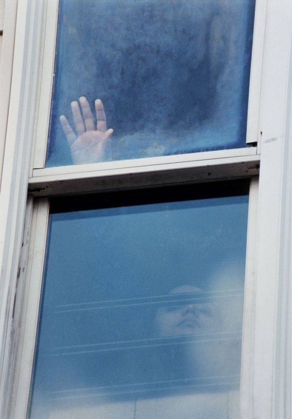 Hand in a window