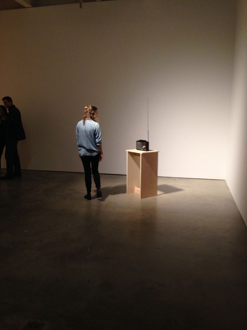 Angel Nevarez and Valerie Tevere, radio on a table transmitting radio play written by the two artists and transmitted via radio signal in the gallery