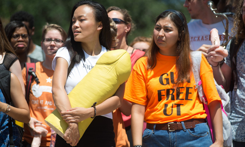 Students at the University of Texas Austin participating in the “Cocks not Glocks” event to protest Texas’s new open-carry law for campuses. Photograph: Zuma/Rex/Shutterstock via The Guardian