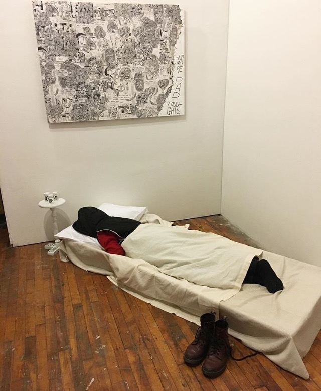 Marissa Paternoster asleep at the opening. Photo by Nneka Anyaoku.