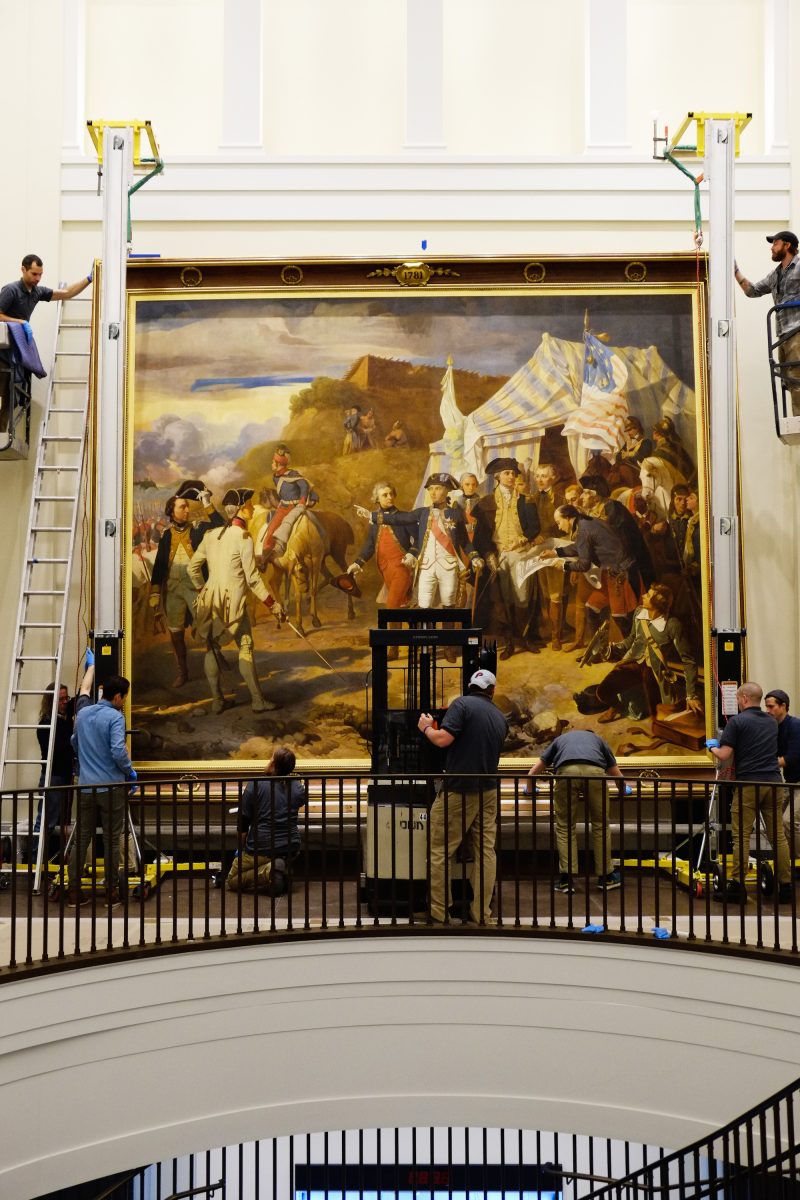painting being installed at American Revolution Museum