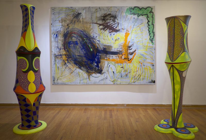 painting by Tyler Wilkinson and two totems by Claes Gabriel