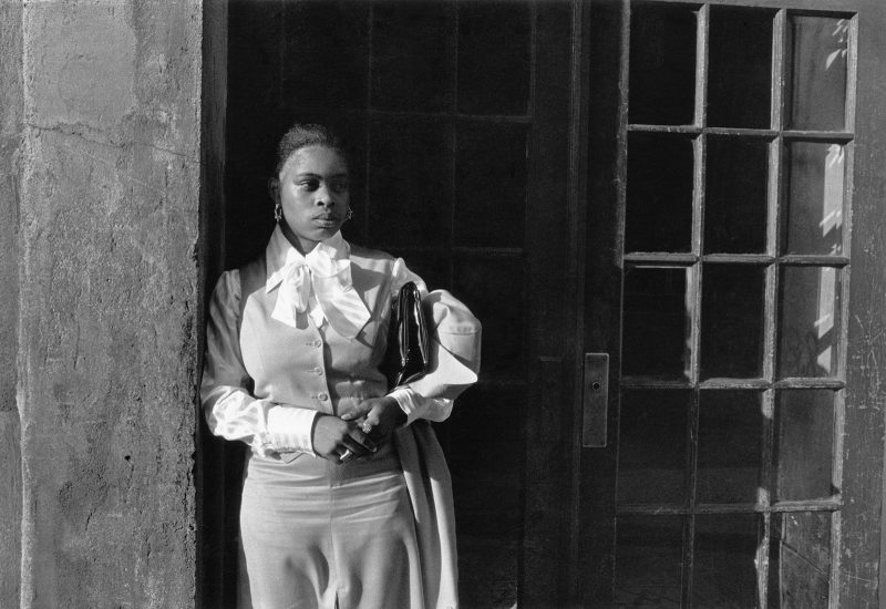 Dawoud Bey, A Woman Waiting in a Doorway photograph