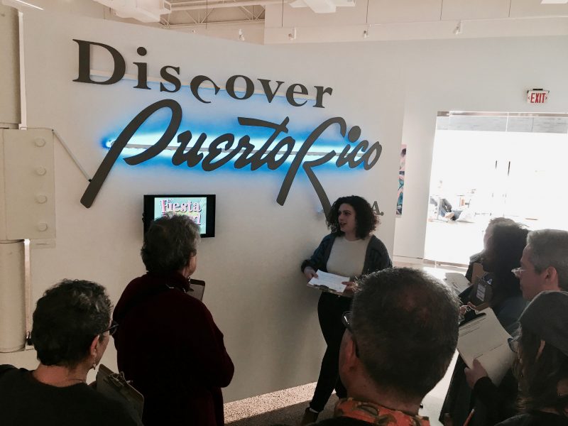 Discover Puerto Rico sign is part of Roxana Perez-Mendez exhibit at Taller Puertorriqueño