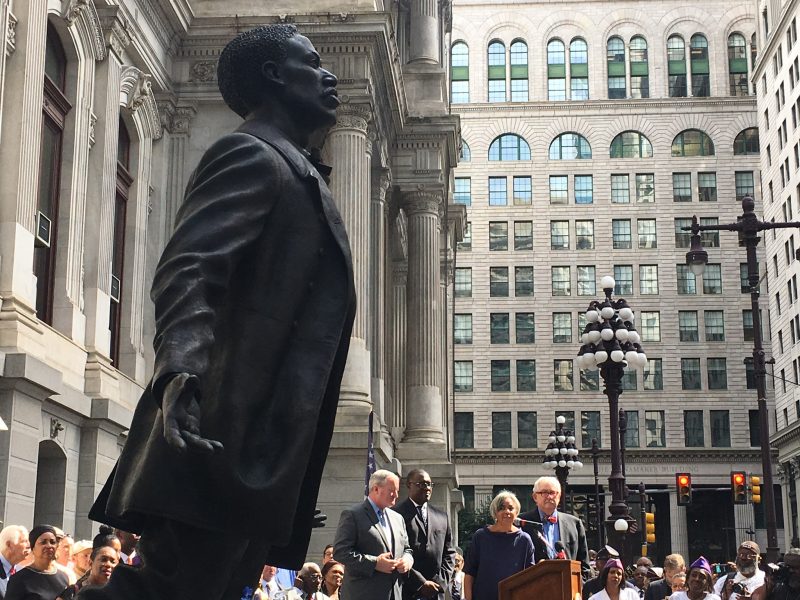 Octavius Catto Memorial statue unveiled at City Hall, Philadelphia. In background, l-r, Mayor James Kenney, sculptor, Branly Cadet, James Straw, O.V. Catto Memorial Fund, Carol Clark Lawrence, Chair, O.V. Catto Memorial Fund