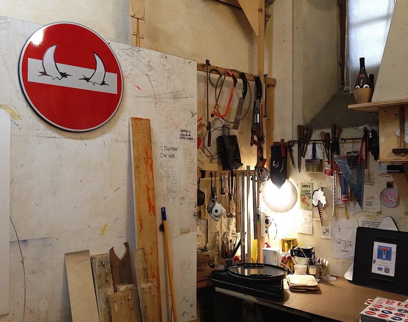 Clet’s Studio view: Bullhorns and work desk, Florence, Italy.