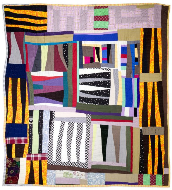 Mary Lee Bendolph, “Strip Quilt," Mixed fabrics, including polyester, corduroy, and cotton blend 82 x 75 inches, 2006. Image: Courtesy of Rubin Bendolph Jr. in honor of Mary Lee Bendolph.