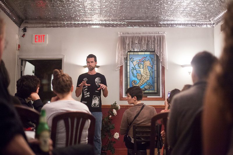 Jason Mitchell speaks at Frank O'hara's Last Lover, in the original location of the reading group, Snockey's Oyster House, Rose Room.