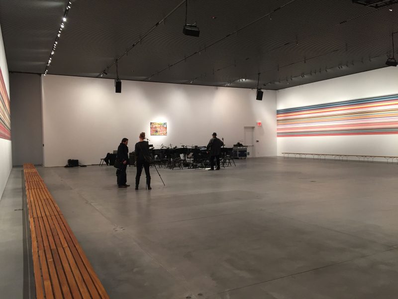 Gerhard Richter’s paintings hang in the gallery in preparation for Reich Richter Pärt, a collaborative performance with composer Steve Reich. Photo by Mandy Palasik.