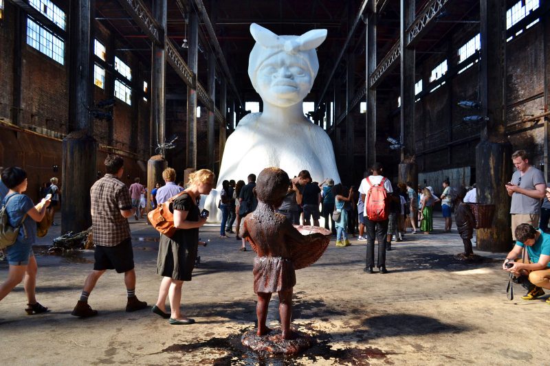 A Subtlety (The Marvelous Sugar Baby, an Homage to the unpaid and overworked Artisans who have refined our Sweet tastes from the cane fields to the Kitchens of the New World on the Occasion of the demolition of the Domino Sugar Refining Plant), Kara Walker. Installation view, Domino Sugar Factory, Brooklyn, New York, 2014. Photo courtesy of Gigi Altarejos.