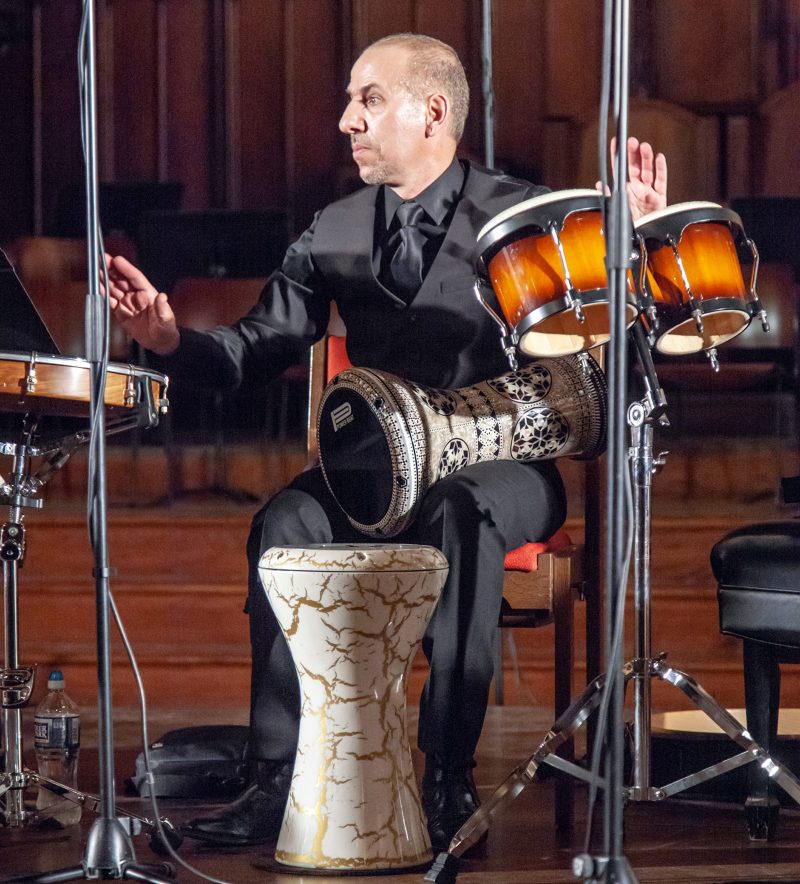 Hafez Kotain performing at the Trinity Center for Urban Life. Photo courtesy Chip Colson.