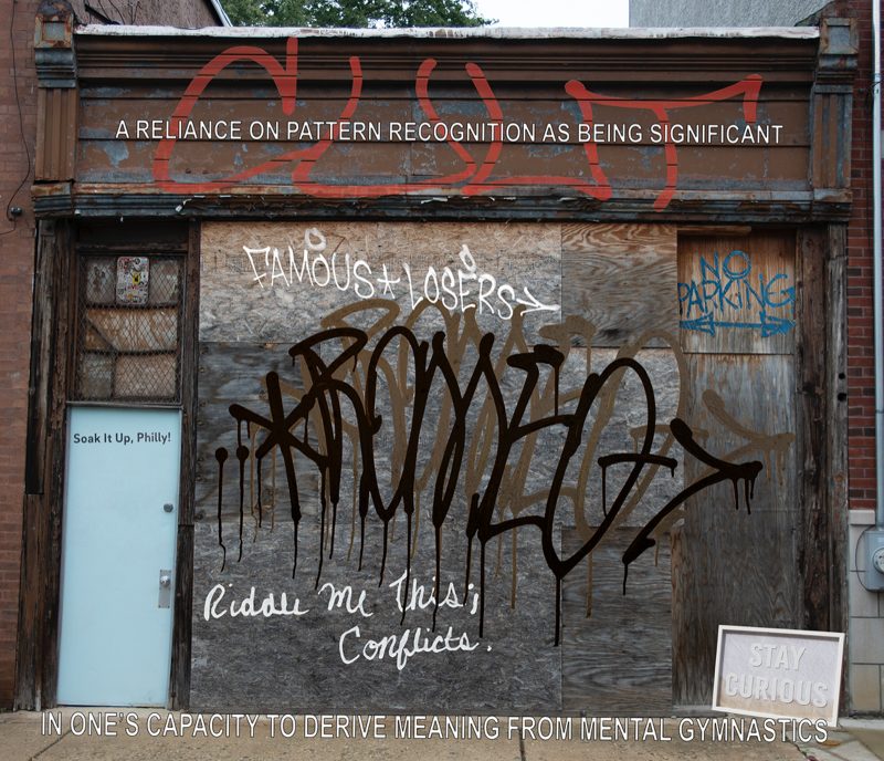Worn down garage with graffiti on it. Writing superimposed on top includes "A Reliance on Pattern recognition as being significant," "Stay Curious" "In one's capacity to derive meaning from mental gymnastics," "Soak it up philly!" and in graffiti, "No Parking," and "FAMOUS * LOSERS"