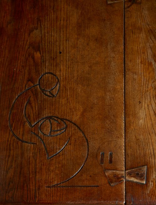 Detail of the "Thunder Table" showing Esherick's carving of the lead actors from Hedgerow's production of Thunder on the Left in 1929