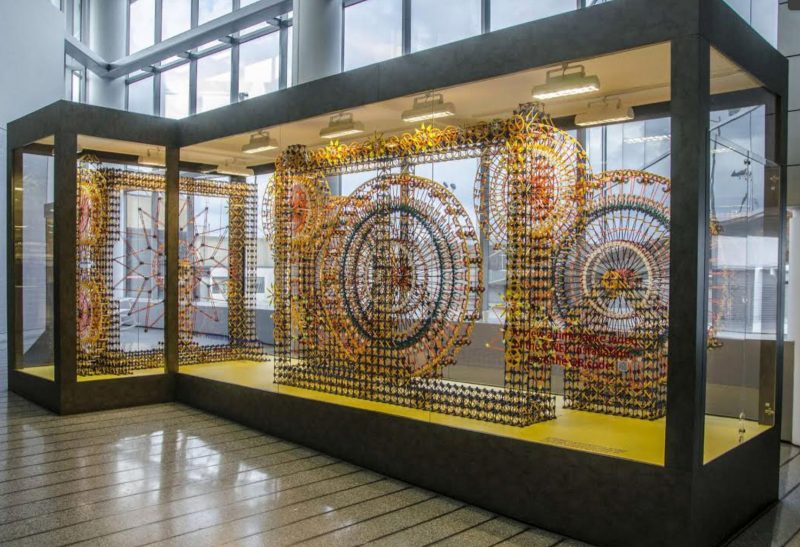 Glass case display of sculptures made with K'NEX at the Philadelphia International Airport.