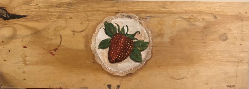 Painting of a Strawberry in a white circle trimmed with lace. Painted on wood.