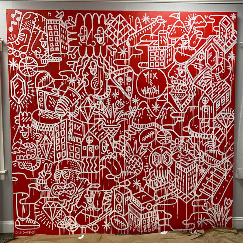 Graffiti artwork of buildings, ladders, footballs, jewels, figures, pizza, buildings, and more on a large red canvas.