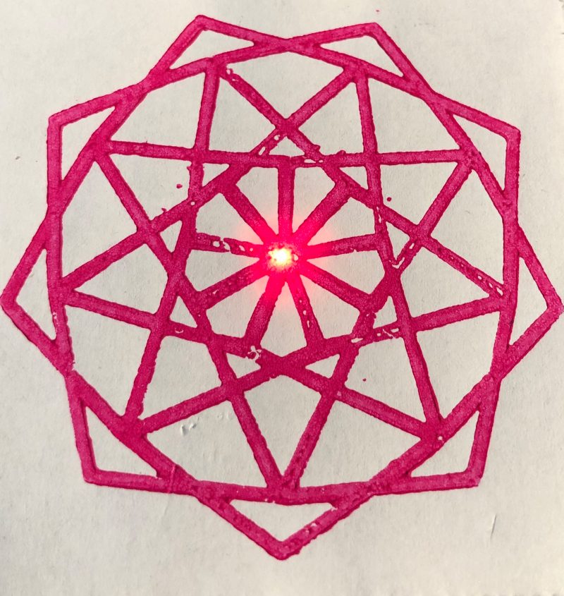 red geometric shapes overlapping to make a spherical pattern