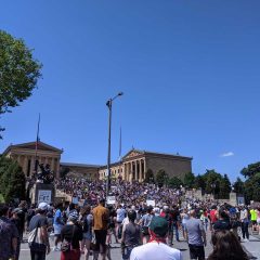 Hundreds of protestors on steps outside of the Philadelphia Museum of Art