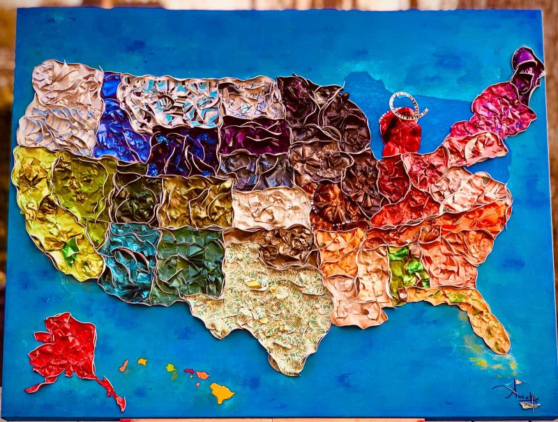 Map of the United states made with nesspresso pods and other unidentifiable materials. 